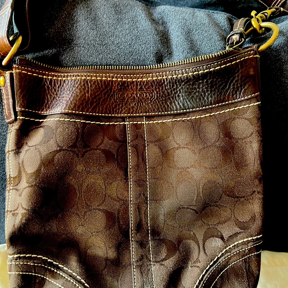 Classic brown coach crooks bag used body leatner still rich